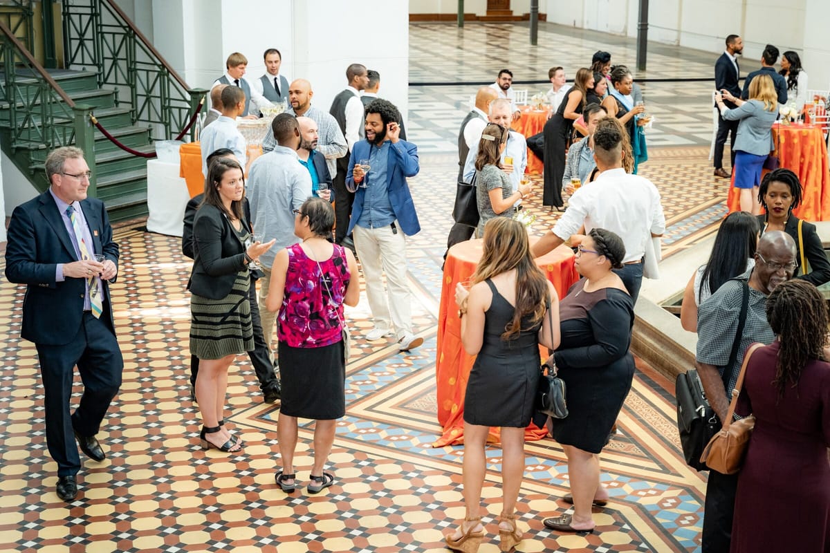 Health Policy Research Scholars networking in a university atrium