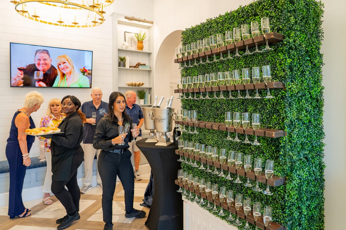Wellen Park team raising a toast during the Palmera grand opening