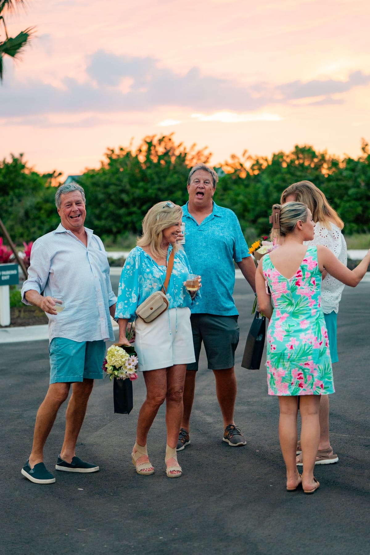Guests laughing together during the Wellen Park evening celebration