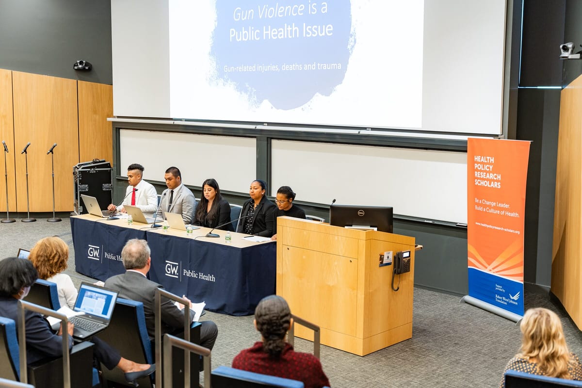 Panel discussion with audience Q&A in a university lecture hall
